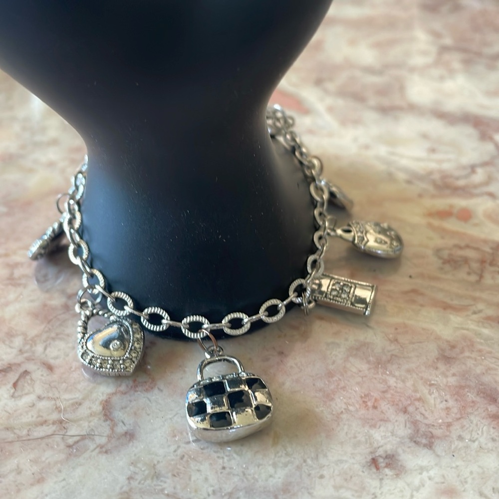 EUC~Woman’s Silver/Cubic Zirconia 9 Charm Purse Toggle Closure 8 Inch Bracelet